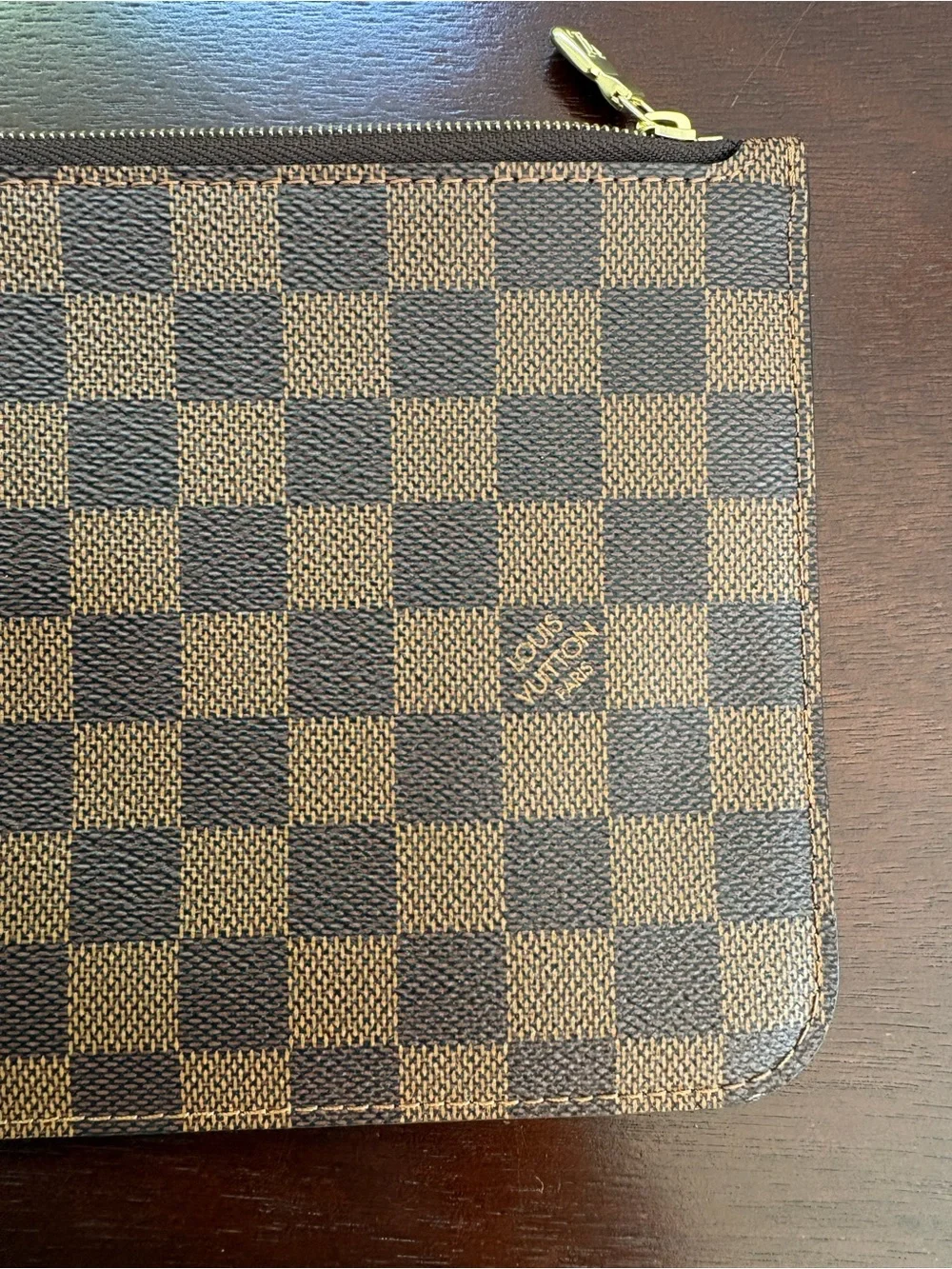 Never used Louis Vuitton Neverfull pouch